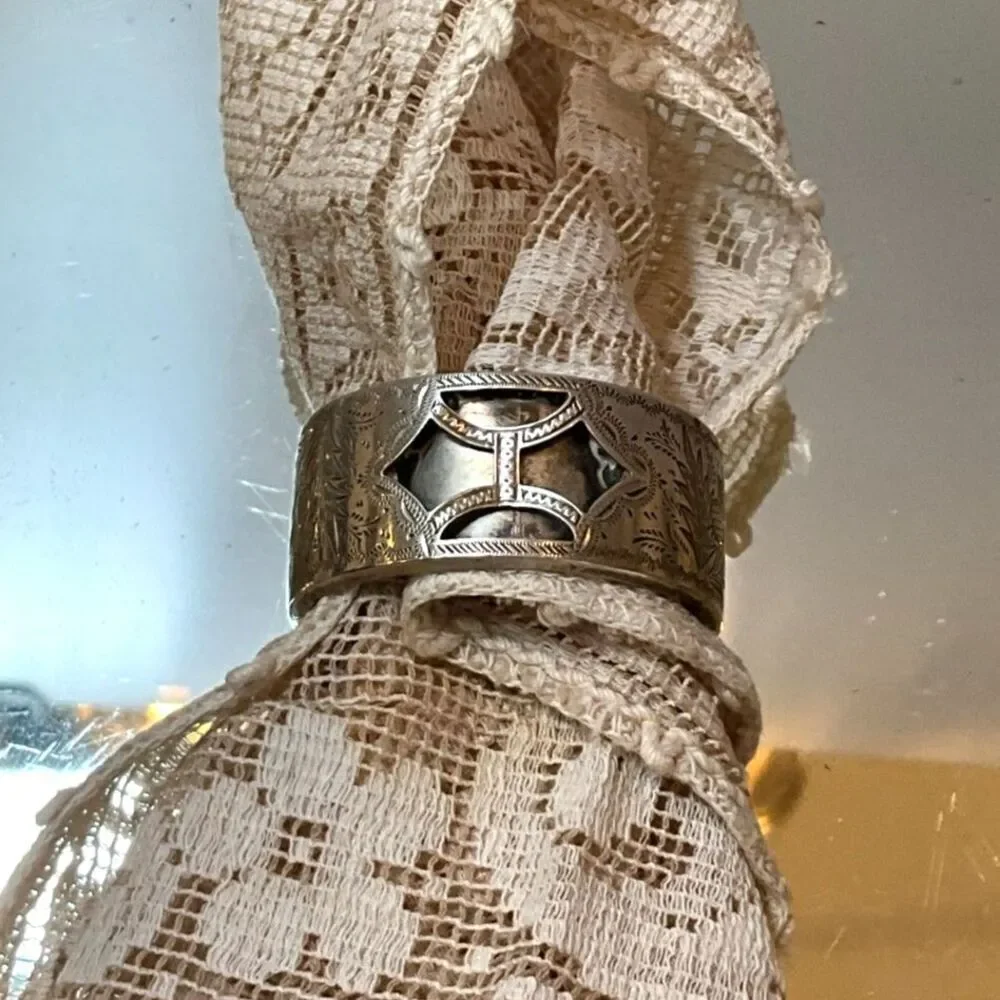 Stunning Sterling silver vintage napkin ring; open work front must see